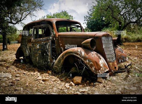 A rusty old vintage car, Mallorca Stock Photo - Alamy