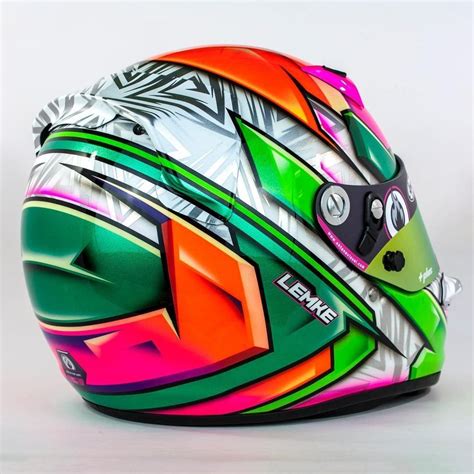 a colorful helmet is shown on a white background