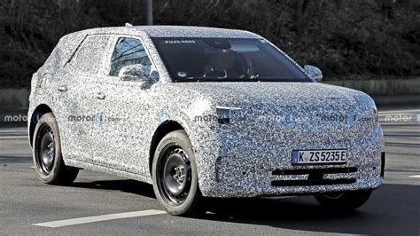 Ford Electric Crossover Tries To Hide Boxy Design In New Spy Photos