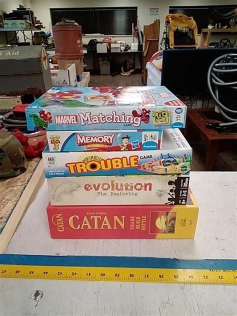 Group of family board games | Live and Online Auctions on HiBid.com