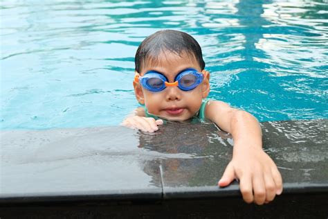 4 Person Playing in Ocean during Daytime · Free Stock Photo