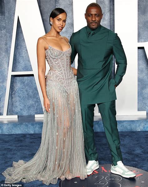 Idris Elba is joined by glamorous wife Sabrina as she stuns in a ...