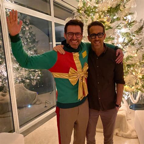 Ryan Reynolds and Hugh Jackman bring back their feud with Christmas Day sweater in these photos ...