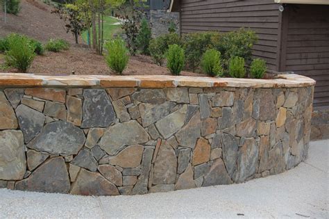 moss & flagstone retaining wall | Flagstone, Front yard patio, Building a retaining wall