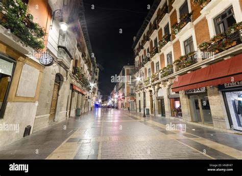 Leon, Spain - August 22, 2014: Night scene of typical street in ...