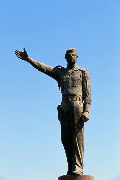 a statue of a man with his arms outstretched