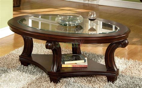 30 Collection of Oval Glass and Wood Coffee Tables