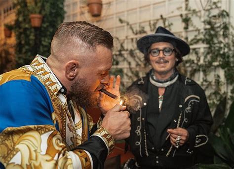 Conor McGregor enjoys a raucous night out with Johnny Depp in Rome ...