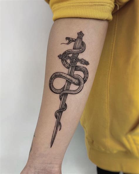 Sword and Snake Tattoo | Tattoos, Snake tattoo, Sword tattoo