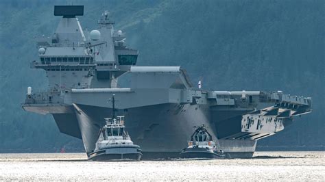 Britain’s £3billion flagship aircraft carrier HMS Queen Elizabeth ‘catches fire’ while docked in ...