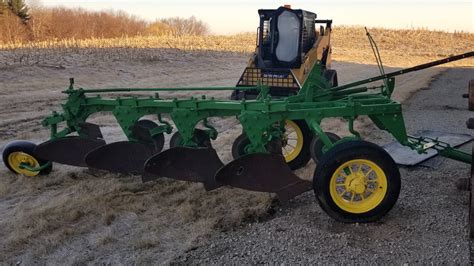 John Deere 4-bottom Plow at Davenport 2019 as F202 - Mecum Auctions