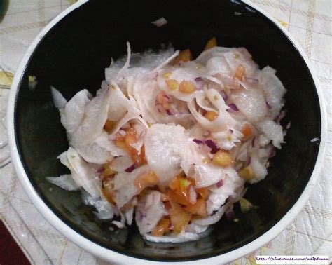 LABANOS(raddish) SALAD w/ red onions and tomatoes: mixed them all then put vinegar and a little ...