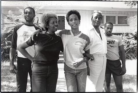 Whitney Houston, center, with her mother, Cissy Houston; father, John Houston, second from right ...