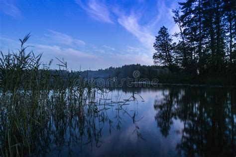 Peaceful Night Scene with the Starry Sky at a Lake in Lithuania Stock ...