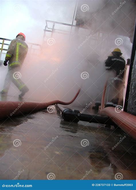 Firefighters Fighting Industrial Fire, Firefighting Team Stock Image - Image of flashover, team ...