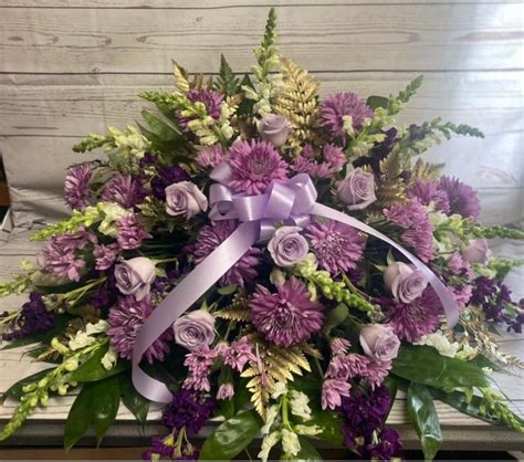 Purple & Gold Casket Spray by Rose Velt Florist