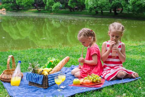 Two little kids on picnic in the park 17705761 Stock Photo at Vecteezy