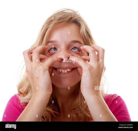 girl makes funny face in closeup over white background Stock Photo - Alamy