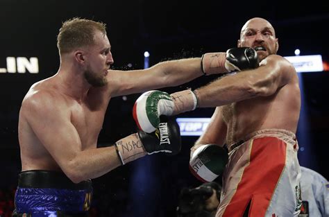 Fury overcomes bloody cut over eye to beat Wallin | AP News