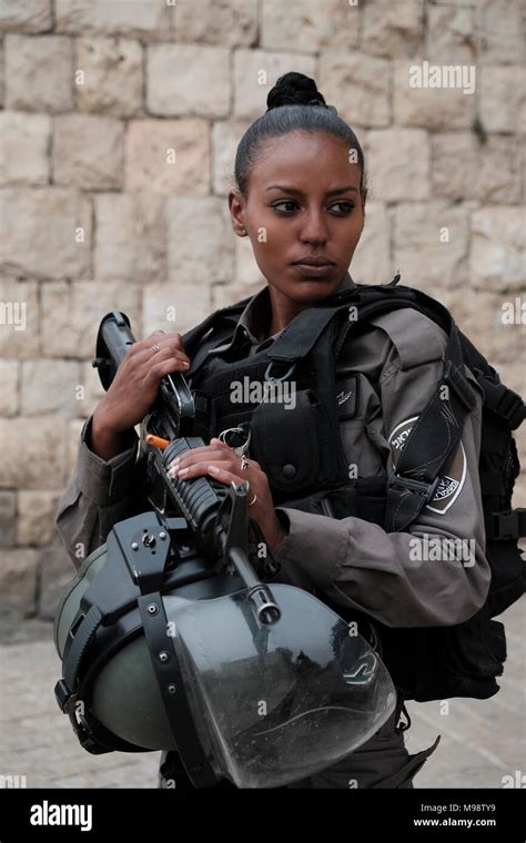 An armed Israeli border policewoman from the Beta Israel community also ...