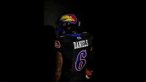 University of Kansas football program debut black uniforms