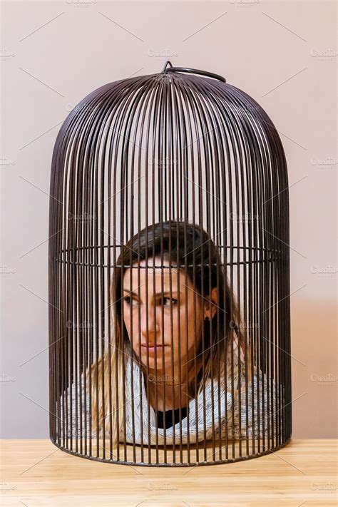 Woman inside cage ~ People Photos ~ Creative Market