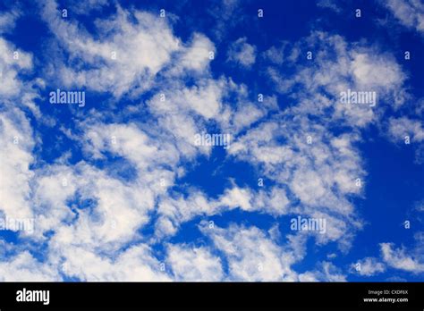 Scattered clouds directly overhead Stock Photo - Alamy