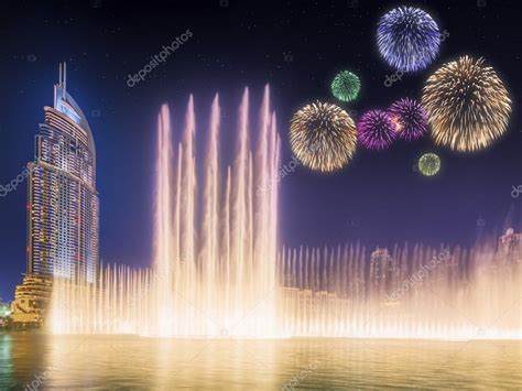 Beautiful fireworks above dancing fountain Burj Khalifa in Dubai, UAE ...