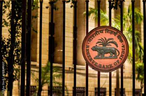 Delhi, India, 2020. RBI logo on the closed iron gate of Reserve Bank of ...