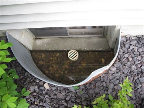 How to Keep Your Basement Dry with Window Well Drains in Nassau County | AM Shield Waterproofing NY