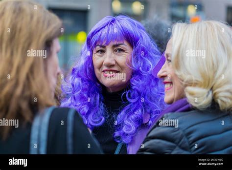 A Smiling woman with violet hair during 8M marches in International ...