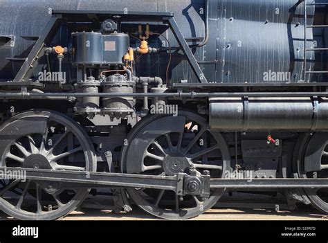 Closeup of a train locomotive’s wheels Stock Photo - Alamy