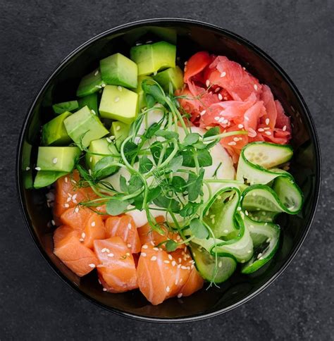 Premium Photo | A bowl of salmon poke with avocado