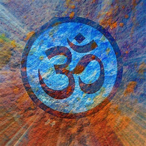 an om shan symbol painted on the side of a building in blue and orange ...