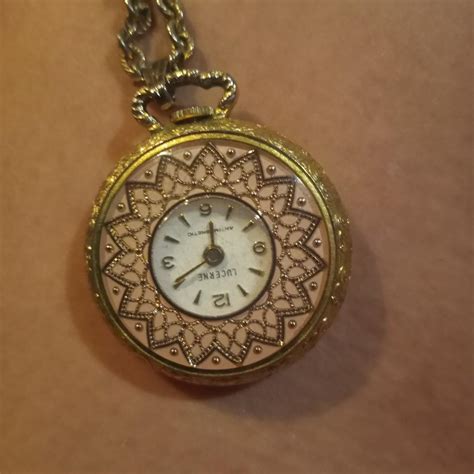 Gold pocket watch | EstateSales.org