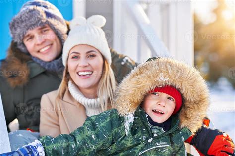 Nice happy family having fun on winter snow 15852396 Stock Photo at ...