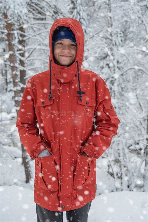 Boy Walking on a Snowy Winter Forest Stock Image - Image of branch, alone: 256575227