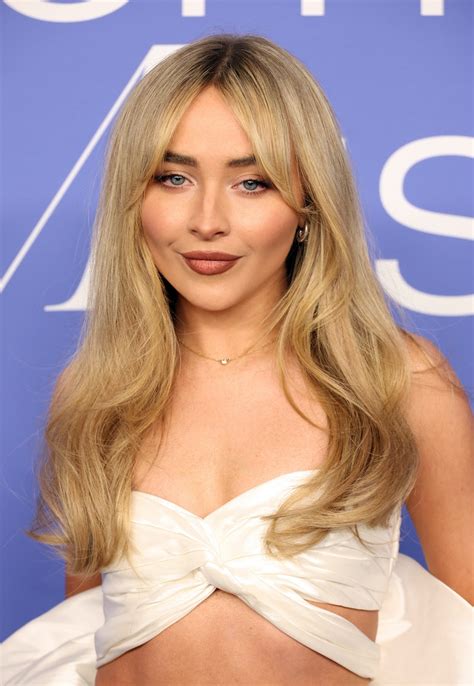 How To Achieve Sabrina Carpenter's Glam Waves & Fluffy Curtain Bangs