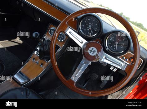 Alfa Romeo GTV 1750 coupe classic red Italian sports car interior dashboard Stock Photo - Alamy