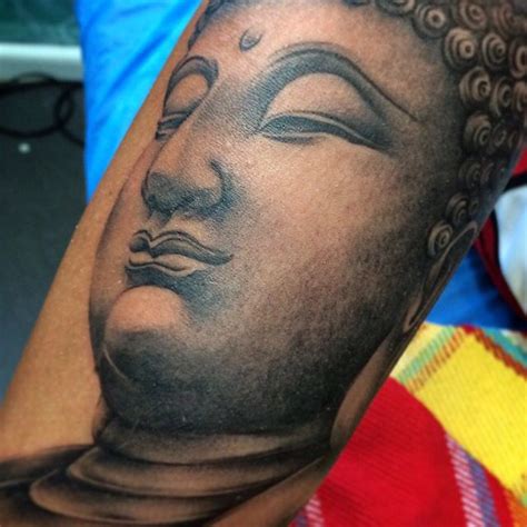 Buddha face tattoo www.patonganesthesiatattoo.com | Buddha face tattoo, Buddha face, Face tattoo