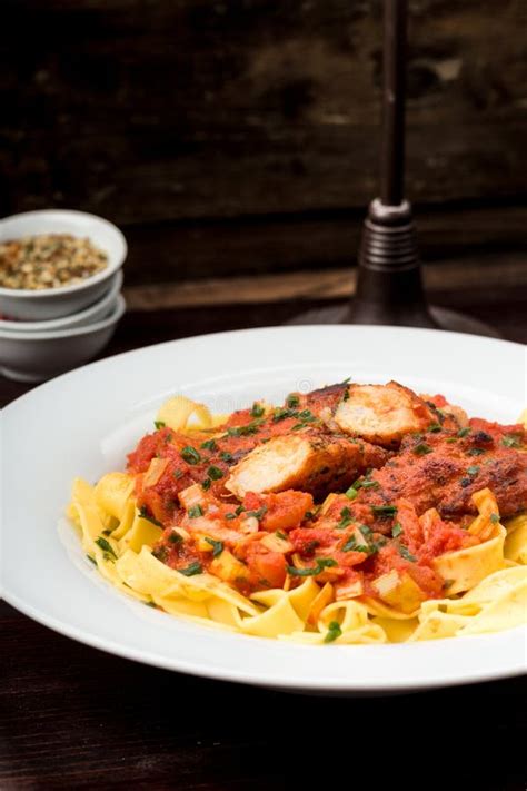 Ribbon Pasta with Chicken and Tomato Leek Sauce Stock Photo - Image of ...