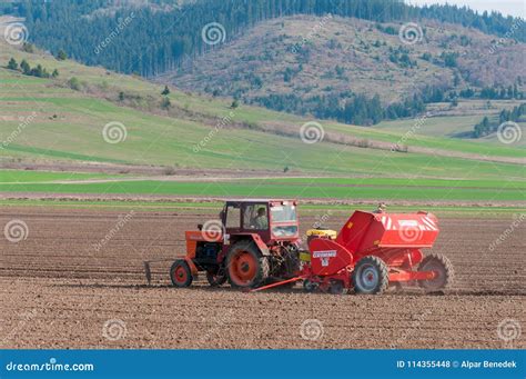 Tractor Planting Potatoes in April Editorial Stock Photo - Image of ...