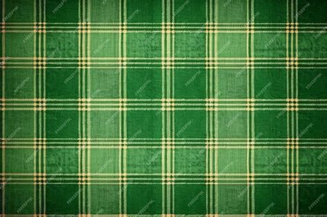 Premium AI Image | Green plaid fabric with a dark green background.