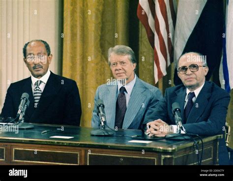 "Anwar Sadat, Jimmy Carter and Menahem Begin at the Camp David Accords Signing Ceremony. ca. 09 ...