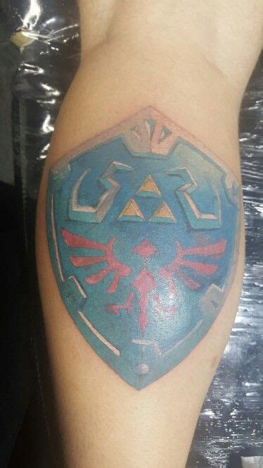 Hylian shield tattoo Shield Tattoo, Deathly Hallows Tattoo, Legend Of ...