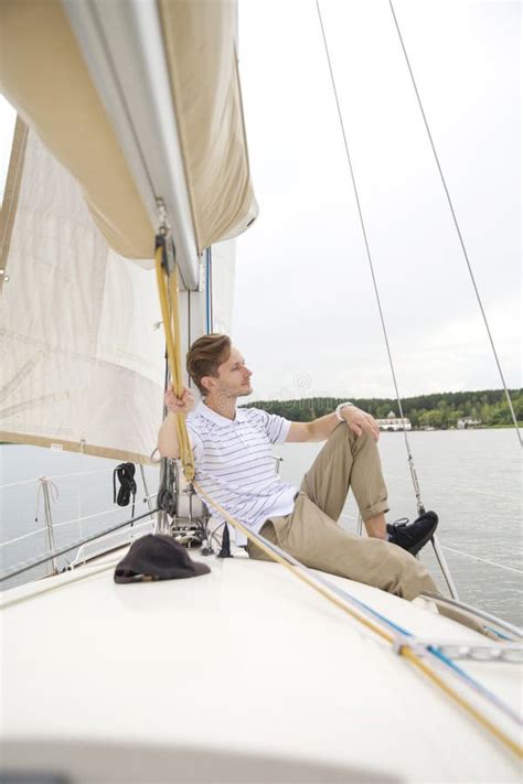 Handsome Young Man on Yacht Stock Image - Image of nautical, away ...