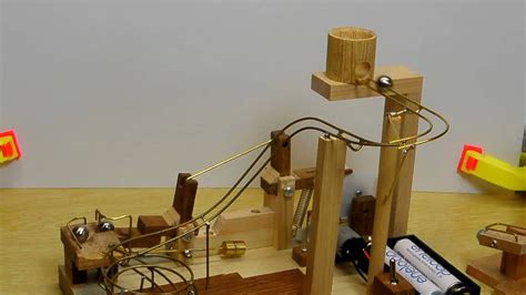 Catapult marble machine | Marble machine, Rolling ball sculpture, Wooden marble run