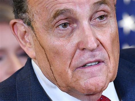 Donald Trump lawyer Rudy Giuliani’s hair dye runs down his face during ...