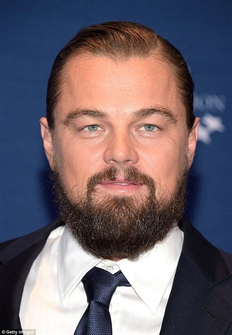Leonardo DiCaprio continues to show off his bushy beard and bun ...
