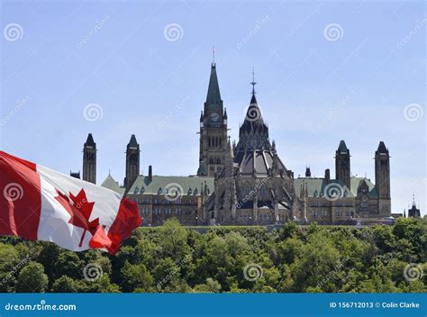 Canadian Parliament Hill, with Canada Flag on the Left Side Stock Image - Image of blue ...